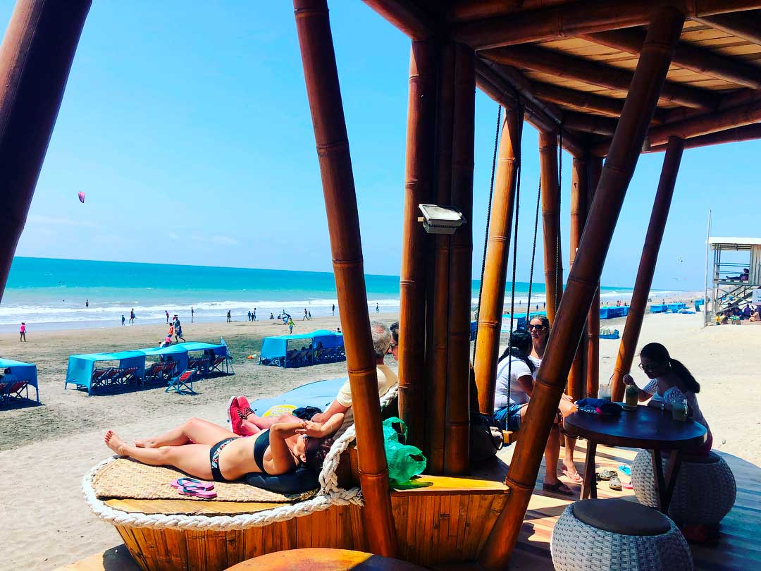 Cruise passengers enjoying the sandy shores of Manta